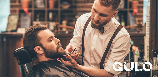 Мужская стрижка, бритье головы или бороды, королевское бритье, стрижка усов в барбершопе Gulo. **Скидка 50%**