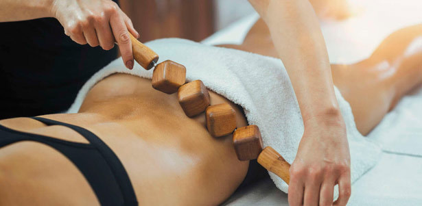 Мадеротерапия, антицеллюлитный, лимфодренажный, медовый, классический, скульптурный и другие виды массажа, обертывание на выбор в студии эстетики тела Harmony. **Скидка до 52%**